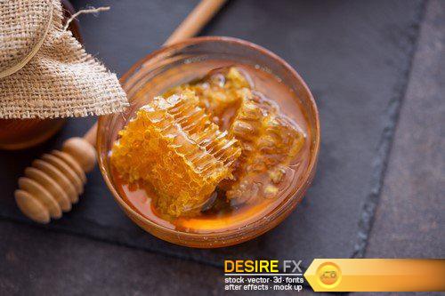 Natural sweet honeycombs with pollen and honey on table 8X JPEG