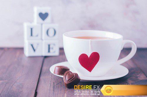 Cup of tea and chocolate candies in shape hearts 7X JPEG