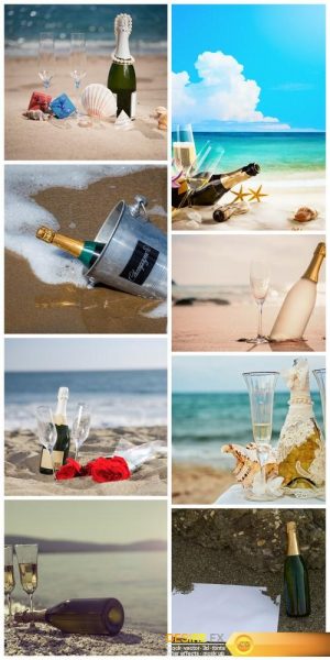 Bottle of champagne on the sand