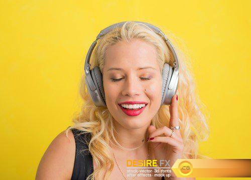 Woman with wireless headphones 8X JPEG