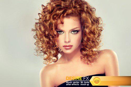 Beautiful girl with curly red hair