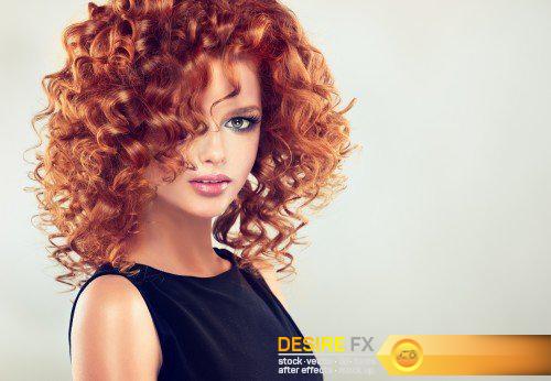 Beautiful girl with curly red hair