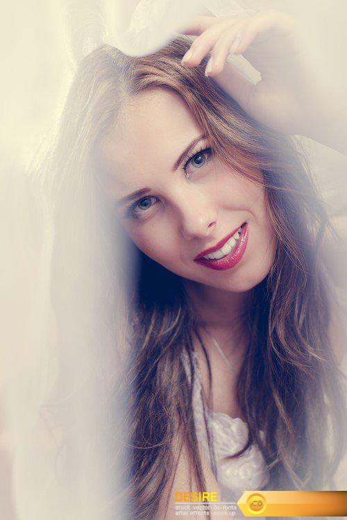 Beautiful young woman on a light background window 15X JPEG