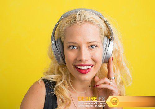 Woman with wireless headphones 8X JPEG