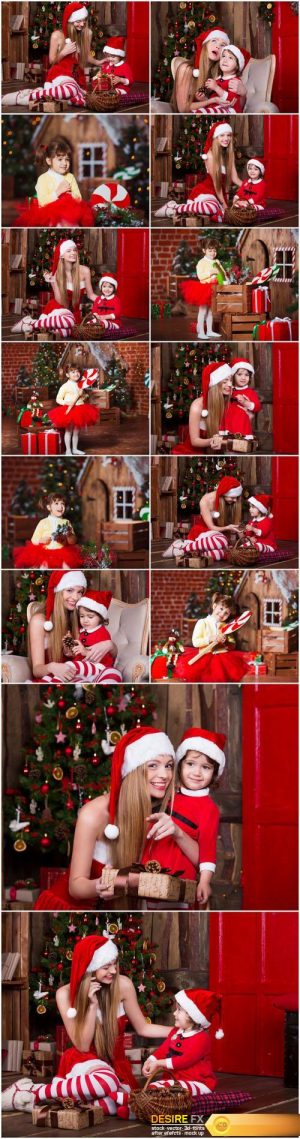 Cute girls sitting with presents near Christmas tree in Santa costumes – 14xUHQ JPEG