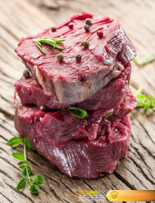 Pieces of beef tenderloin on the wooden cutting board 9X JPEG