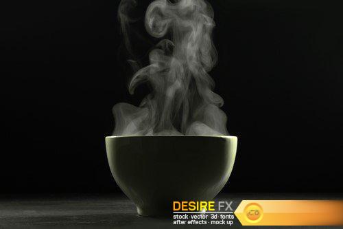 A bowl of hot food and steam on dark background 3X JPEG