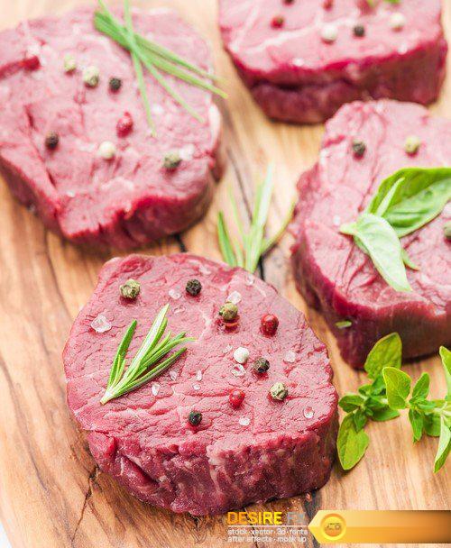 Pieces of beef tenderloin on the wooden cutting board 9X JPEG