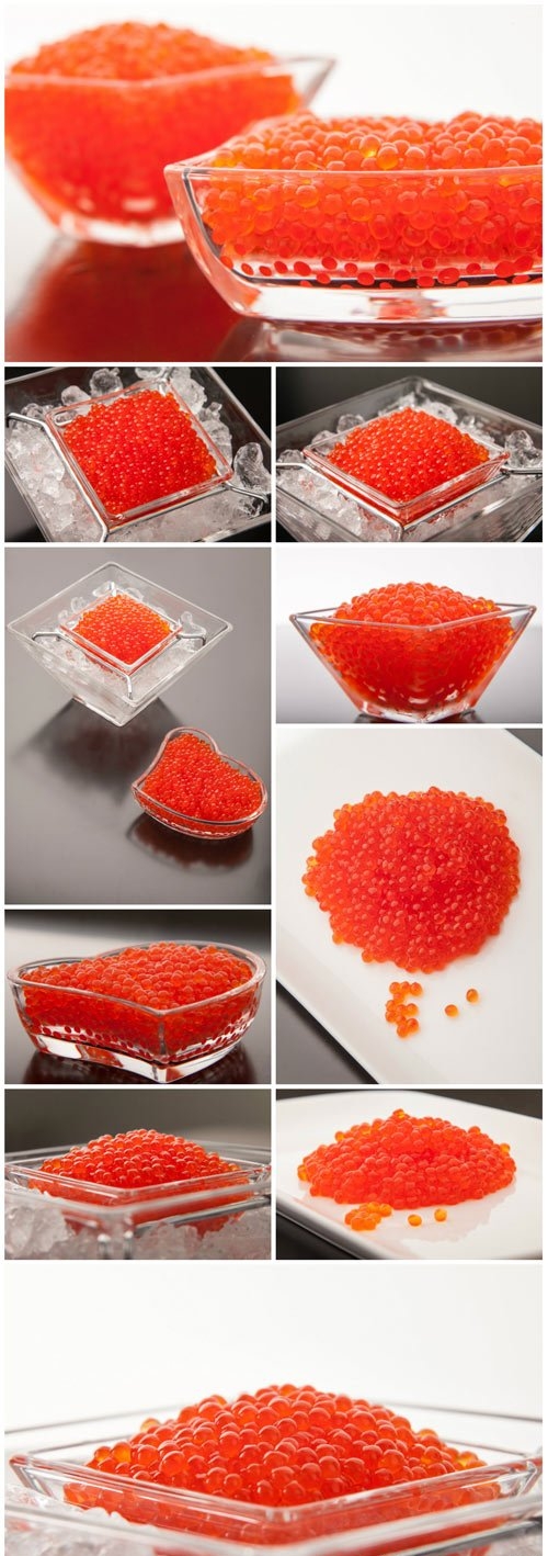 Red caviar in a transparent plate stock photo