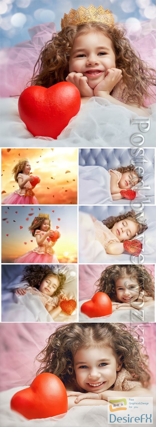 Curly girl with red heart stock photo