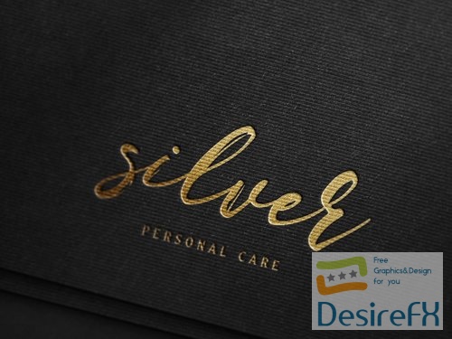 PSD luxury gold foil debossed logo mockup on textured black paper