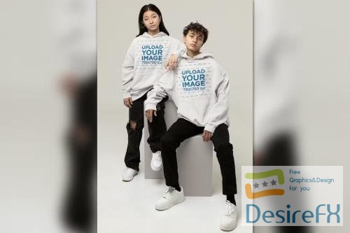 Oversized Hoodie Mockup of a Serious Couple